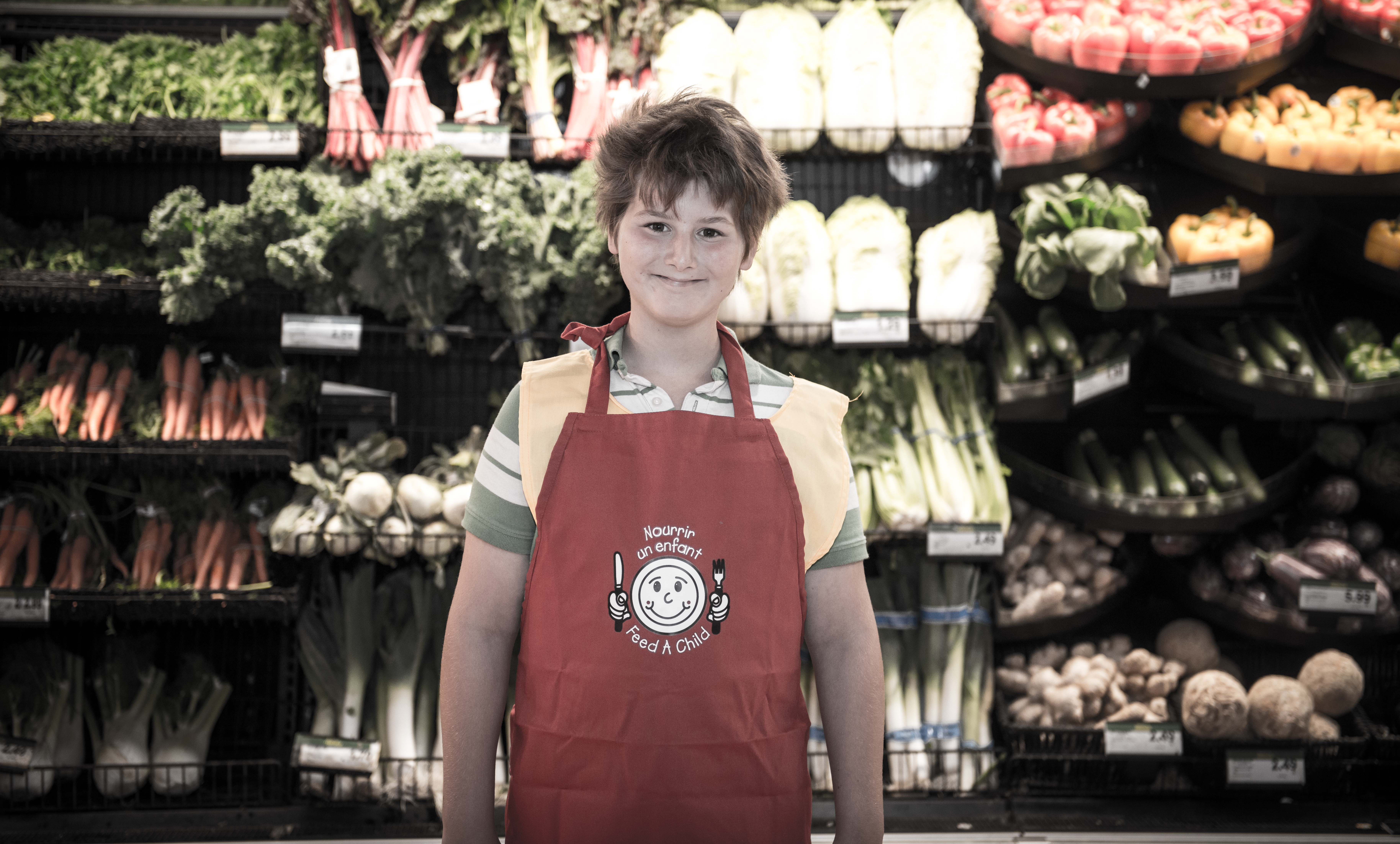 Garçon tablier épicerie